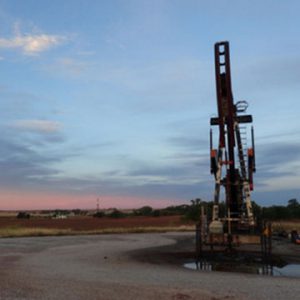 Oil well at sunrise